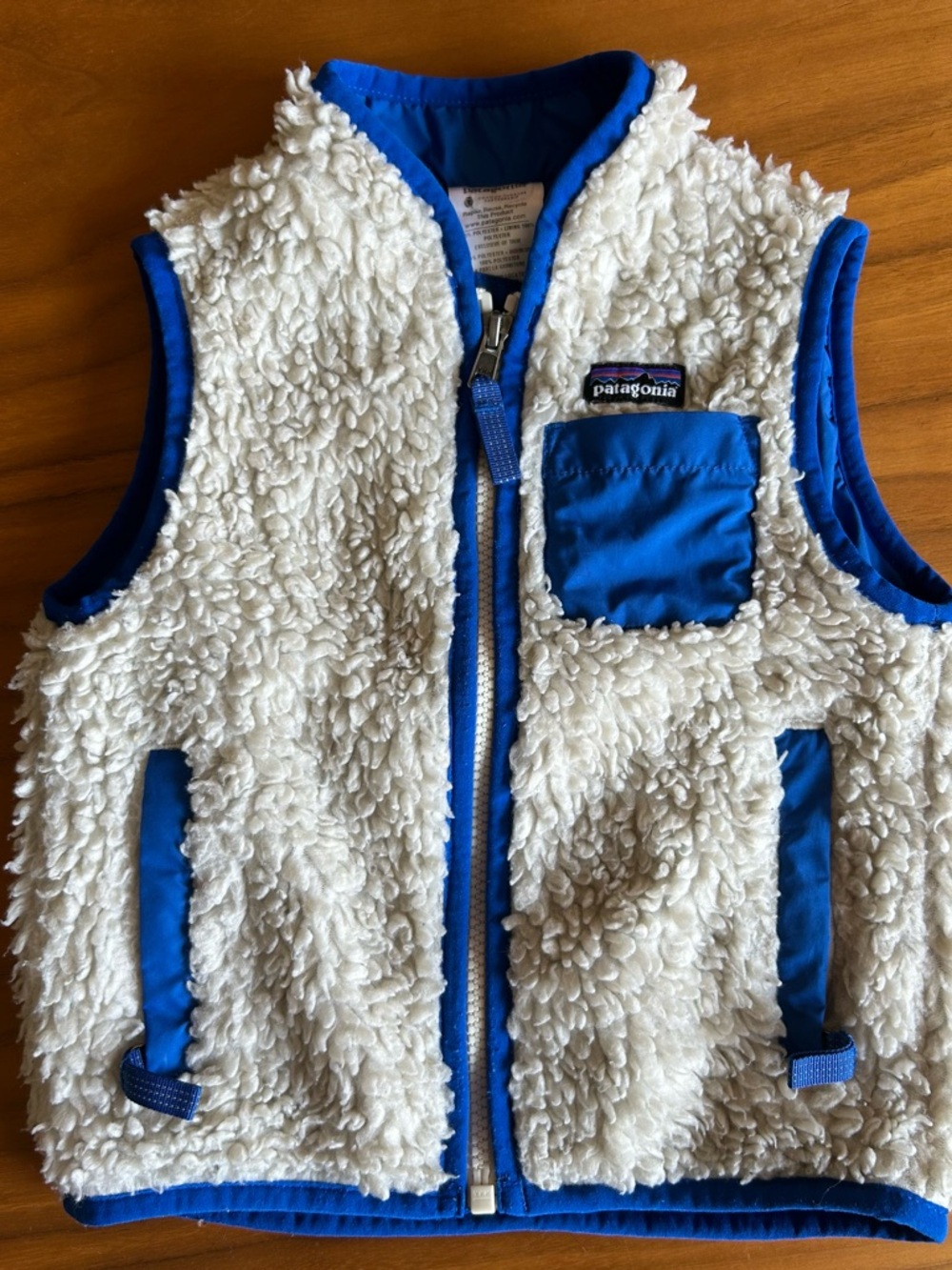 Patagonia retro Cream Sherpa Vest with Bright Blue Trim and Pocket